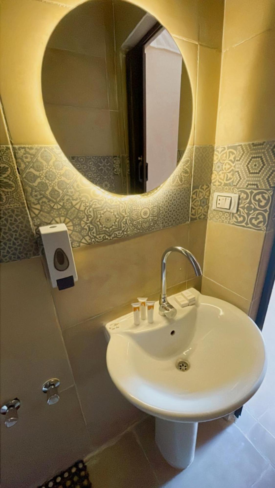 Sami Holiday Inn - Pyramids View Rooftop Al Kawm al Akhdar ภายนอก รูปภาพ