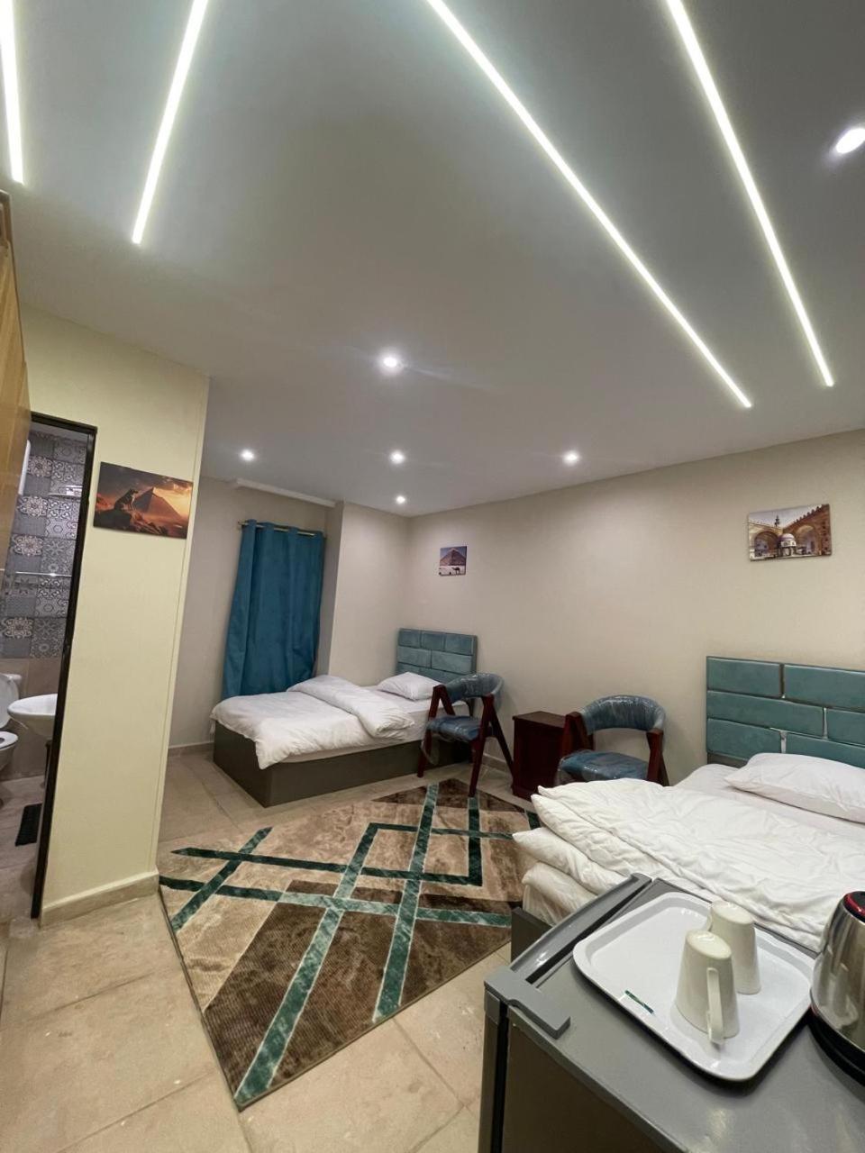 Sami Holiday Inn - Pyramids View Rooftop Al Kawm al Akhdar ภายนอก รูปภาพ