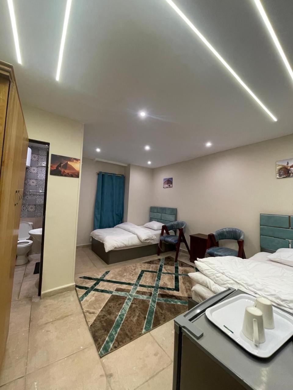 Sami Holiday Inn - Pyramids View Rooftop Al Kawm al Akhdar ภายนอก รูปภาพ